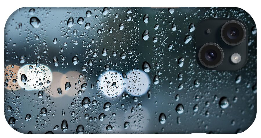 Photography iPhone Case featuring the photograph Rain drops and head lights by Evan Foster