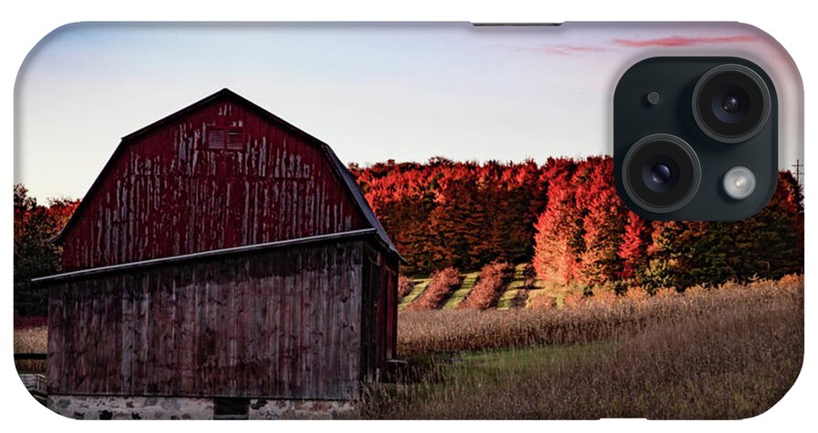Michigan Fall iPhone Case featuring the photograph Red barn at sunrise with fall colors in northern Michigan by Eldon McGraw