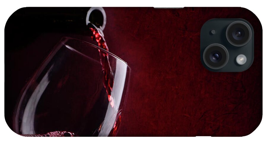 Wine iPhone Case featuring the photograph Red wine pouring in wineglass by Jelena Jovanovic