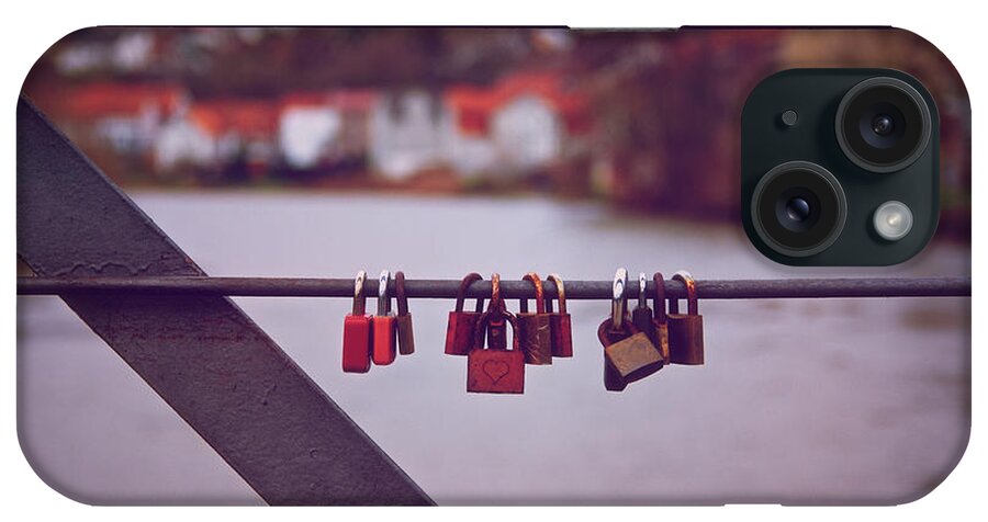 Love iPhone Case featuring the photograph Romantic lover padlocks on a bridge railing by Mendelex Photography