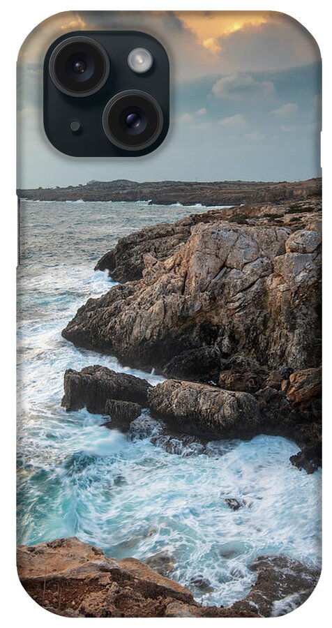 Stormy Sea iPhone Case featuring the photograph Seascape with windy waves during stormy weather at sunset. by Michalakis Ppalis