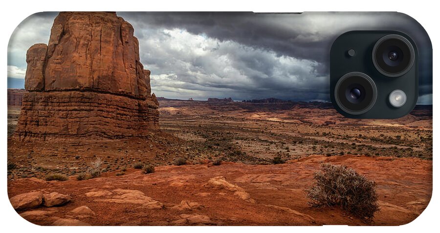 Arches National Park iPhone Case featuring the photograph Storm Clouds over Arches National Park in Moab Utah by Ronda Kimbrow