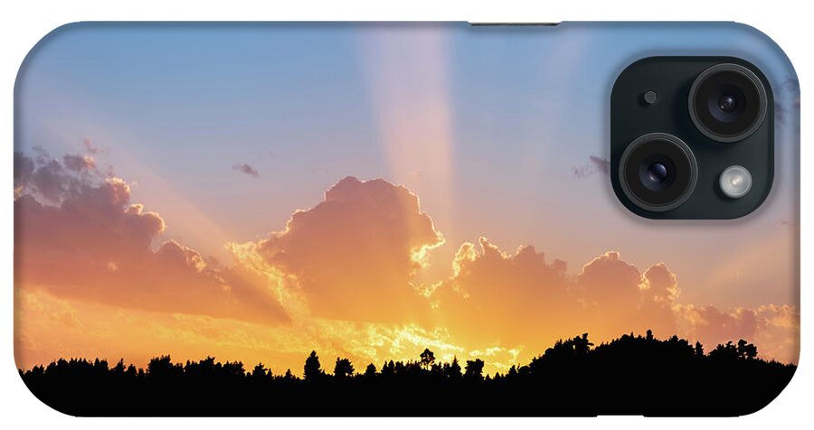 Sunbeam iPhone Case featuring the photograph Sunbeams Shining Over Tree Silhouettes by Alexios Ntounas