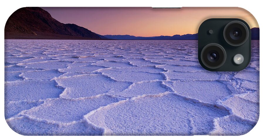 Death Valley National Park iPhone Case featuring the photograph Sunset at Badwater Basin salt pans, Death Valley, California, USA by Neale And Judith Clark