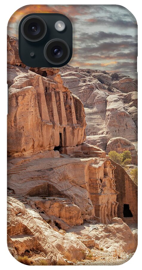 Petra iPhone Case featuring the photograph Sunset at the lost city of Petra, Jordan. Amazing buildings are carved out of the pink rock and the Rose City dates to around 300 BC by Jane Rix