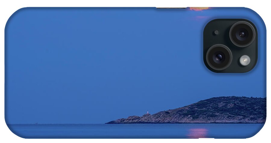 Moon iPhone Case featuring the photograph Supermoon rising behind clouds above the sea by Alexios Ntounas