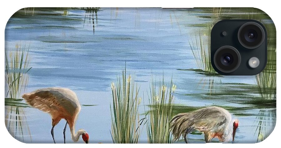 Sandhill Cranes iPhone Case featuring the painting Tending the baby by Sue Dinenno