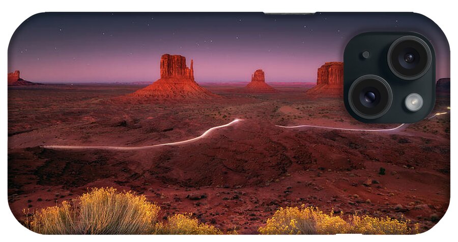 Sunset iPhone Case featuring the photograph Twilight at Monument Valley by Henry w Liu