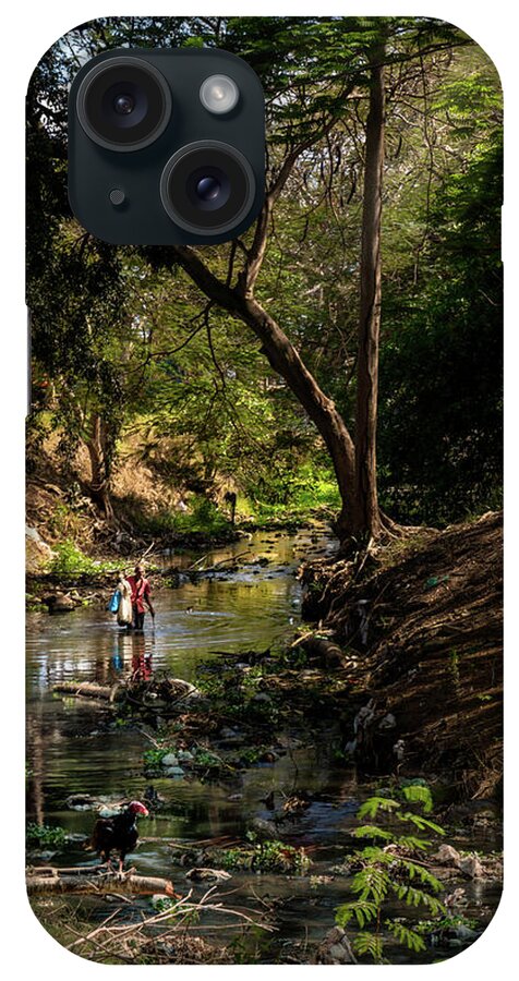 Wading iPhone Case featuring the photograph Wading the Jatibonico river by Micah Offman