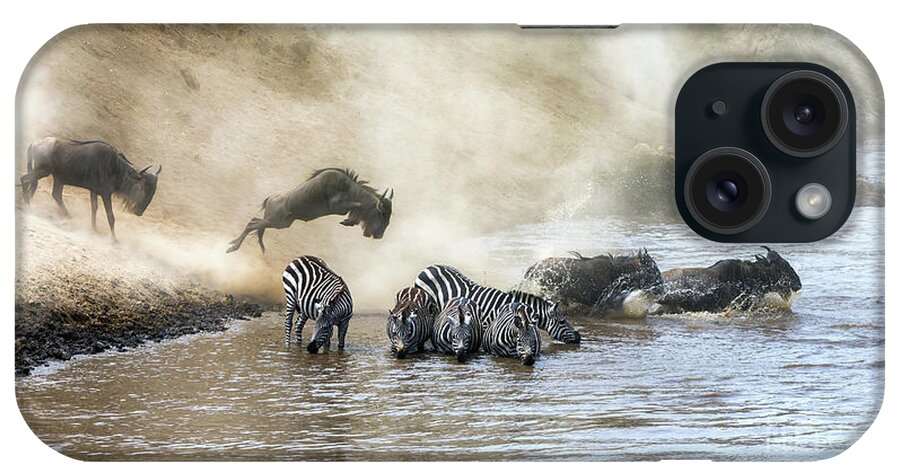 Motion iPhone Case featuring the photograph Wildebeest and zebra cross the Mara River during the annual gre by Jane Rix