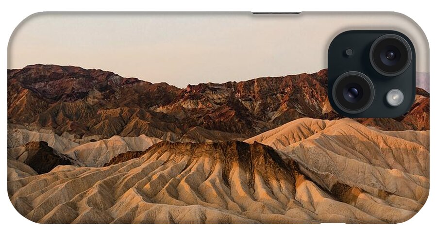 California Pictures iPhone Case featuring the photograph zabriskie point, death valley at sunrise - brown rocky mountain under blue sky during daytime - Zabriskie Point, California, USA by Julien