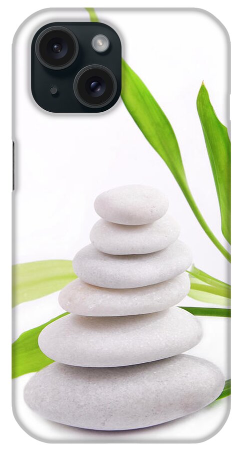 Closeup iPhone Case featuring the photograph Zen stones with bamboo isolated on white background by Severija Kirilovaite