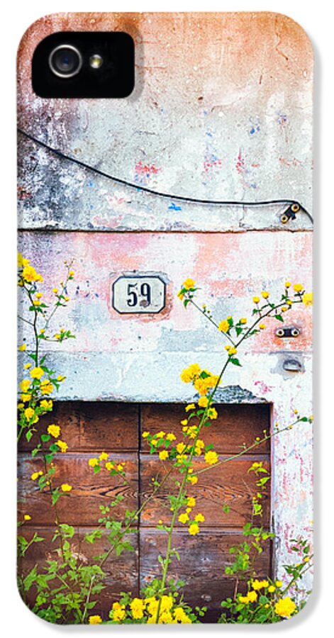 Architecture iPhone 5 Case featuring the photograph Yellow flowers and decayed wall by Silvia Ganora
