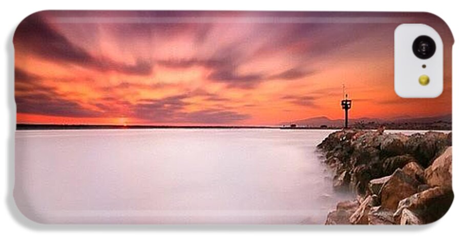  iPhone 5c Case featuring the photograph Long Exposure Sunset Shot At A Rock by Larry Marshall