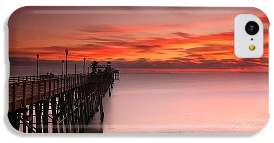 All_sunsets iPhone 5c Case featuring the photograph Long Exposure Sunset At The Oceanside by Larry Marshall