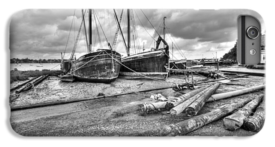 Butt And Oyster iPhone 6 Plus Case featuring the photograph Boats and logs at Pin Mill #2 by Gary Eason