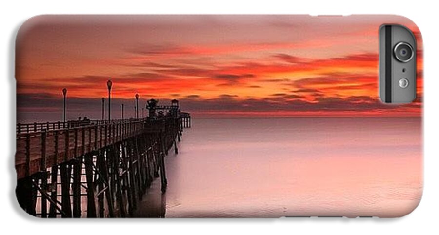 All_sunsets iPhone 6 Plus Case featuring the photograph Long Exposure Sunset At The Oceanside by Larry Marshall