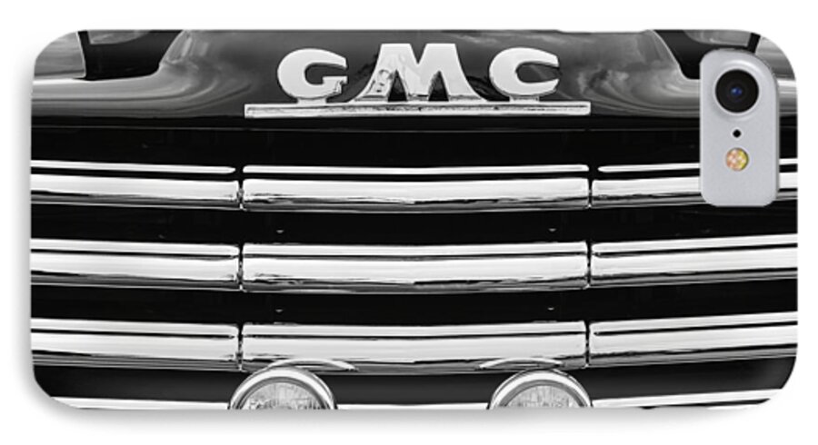 1952 Gmc Suburban Grille Emblem iPhone 7 Case featuring the photograph 1952 GMC Suburban Grille Emblem by Jill Reger