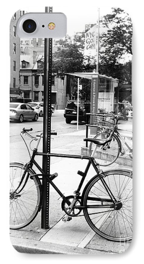 A Bike In Nyc iPhone 7 Case featuring the photograph A bike in NYC by Robin Coaker
