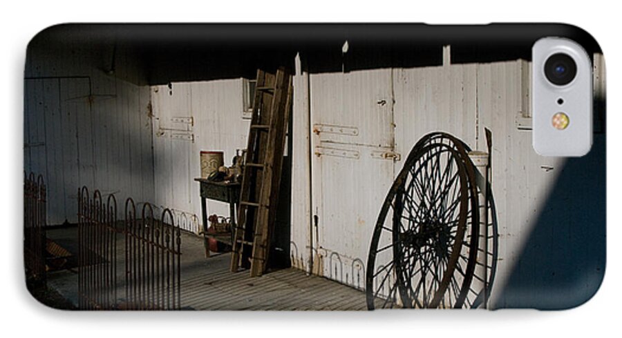 Amish iPhone 7 Case featuring the photograph Amish Buggy Wheel by Greg Graham