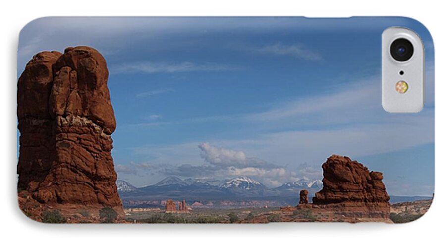 Clouds iPhone 7 Case featuring the photograph Arches National Monument by Suzanne Lorenz