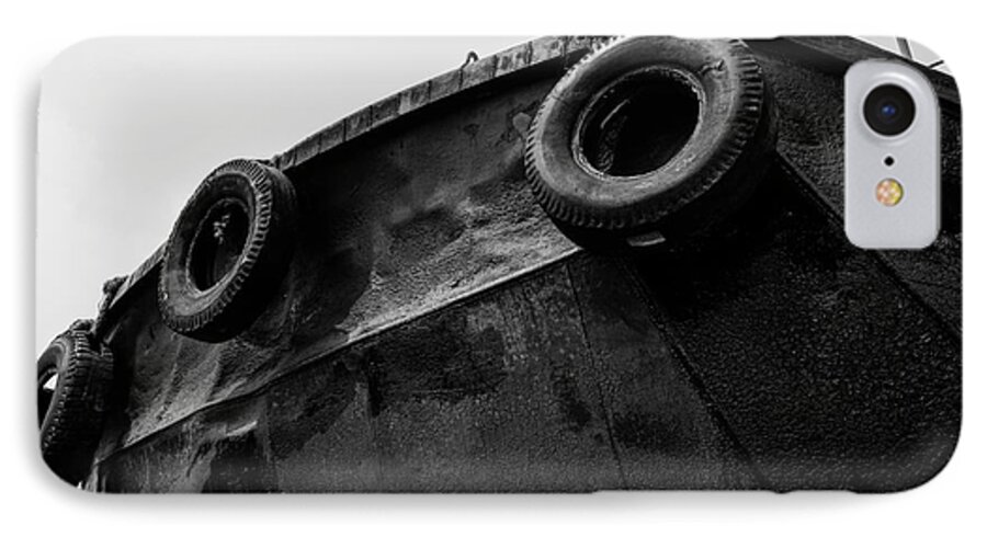 Stern iPhone 7 Case featuring the photograph Black and White Stern with Ladder and Tires by Dean Harte