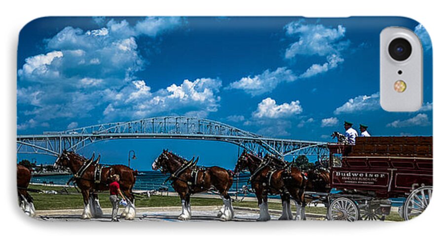 Budweiser iPhone 7 Case featuring the photograph Budweiser Clydsdales and Blue Water Bridges by Ronald Grogan