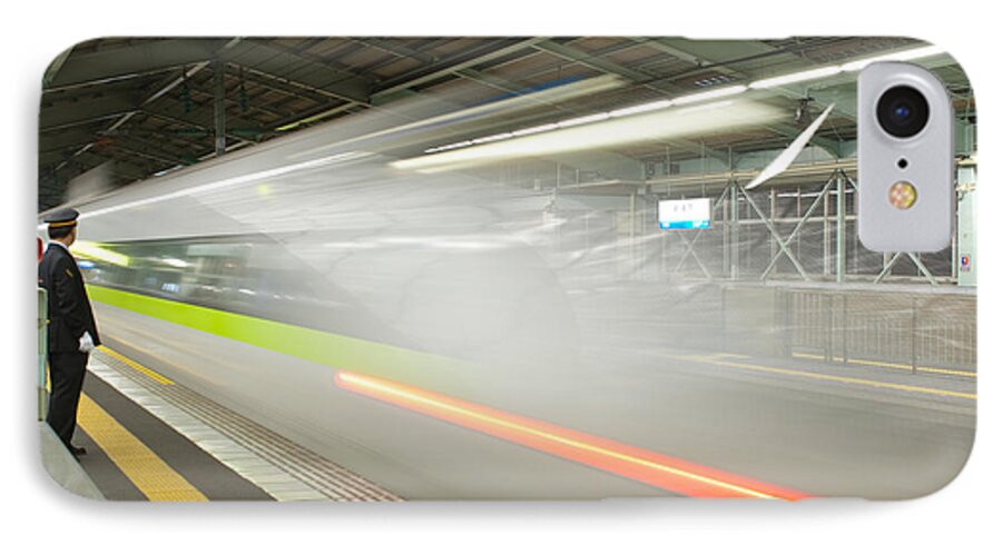 Shinkansen iPhone 7 Case featuring the photograph Bullet Train by Sebastian Musial