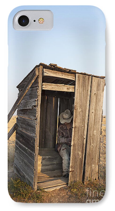 Mannequin iPhone 7 Case featuring the photograph Mannequin sitting in old wooden outhouse by Bryan Mullennix