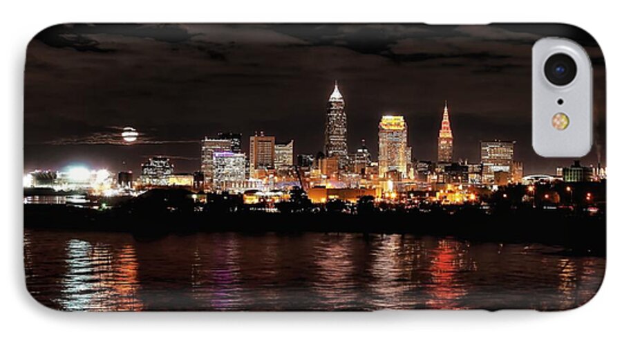 Beaver Moon iPhone 7 Case featuring the photograph Moonrise over Cleveland Skyline by Daniel Behm