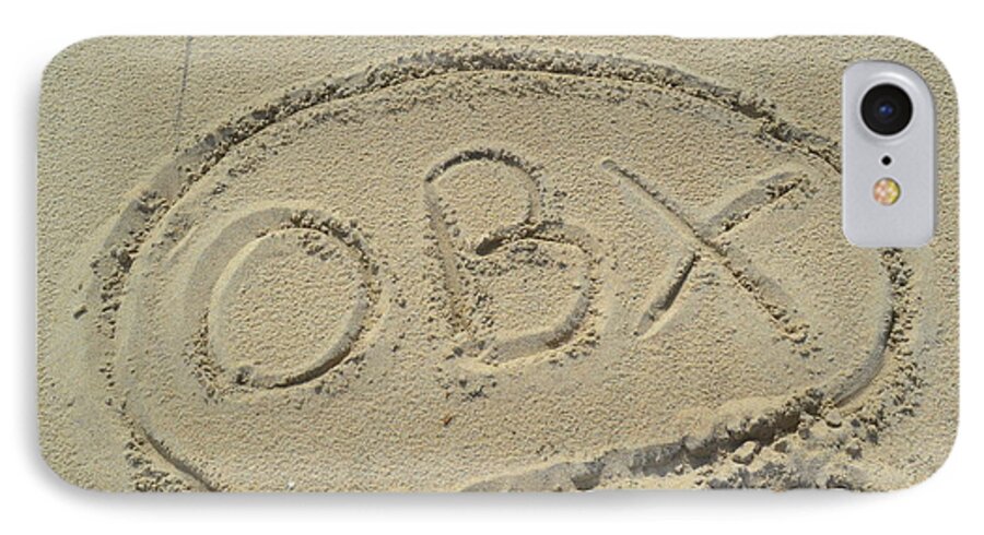 An Obx Outer Banks Sign Drew In The Sand At Cape Hatteras Beach. Obx iPhone 7 Case featuring the photograph OBX Sign in the Sand by Robert Loe