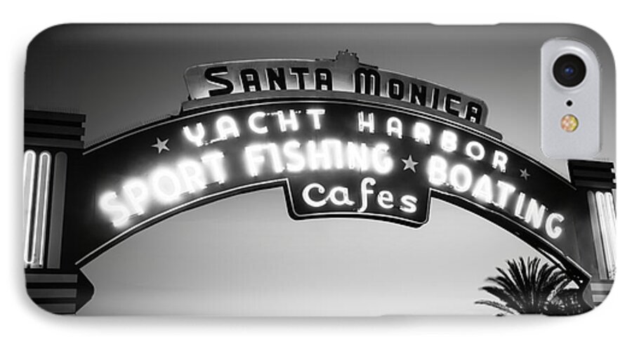 America iPhone 7 Case featuring the photograph Santa Monica Pier Sign in Black and White by Paul Velgos