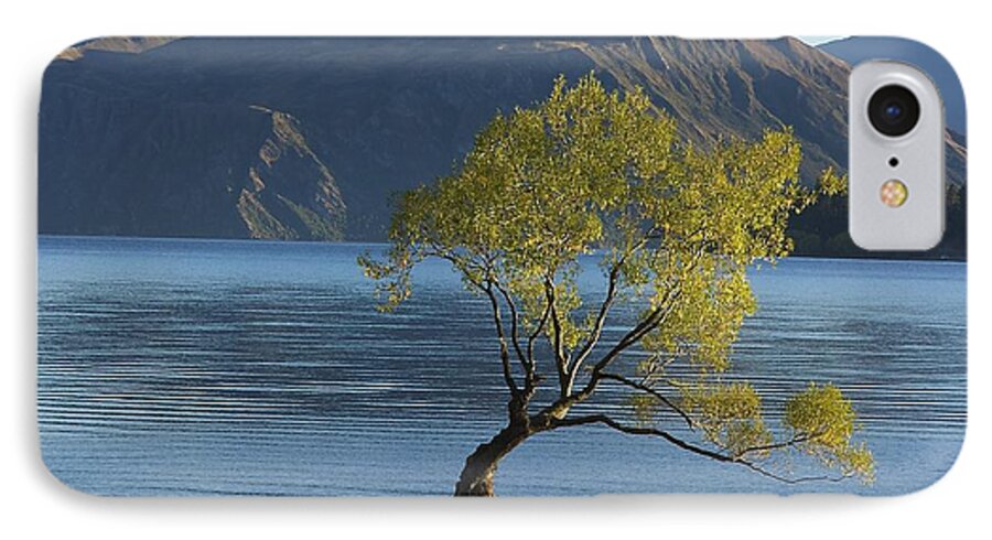 New Zealand iPhone 7 Case featuring the photograph Tree in Lake Wanaka by Stuart Litoff