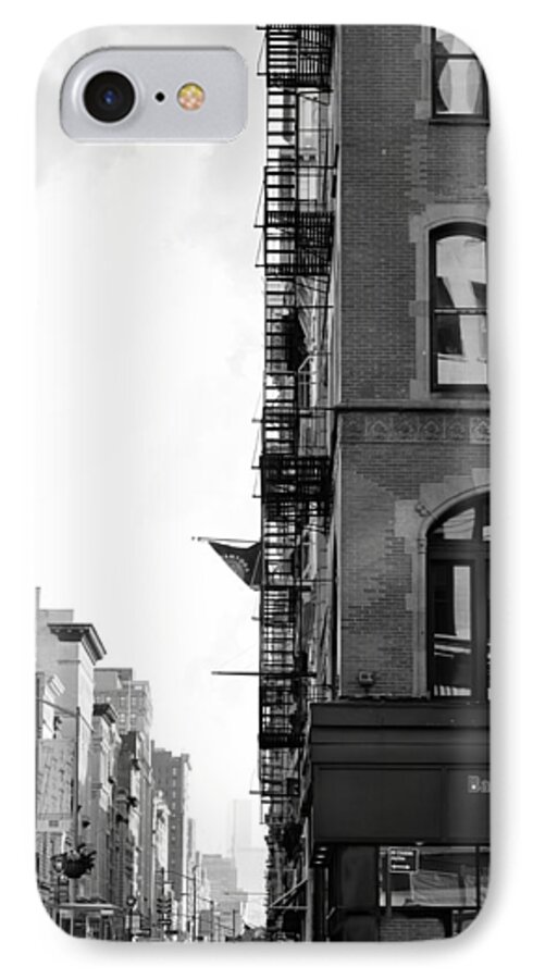 Nyc iPhone 7 Case featuring the photograph West 23rd Street bw by Laura Fasulo