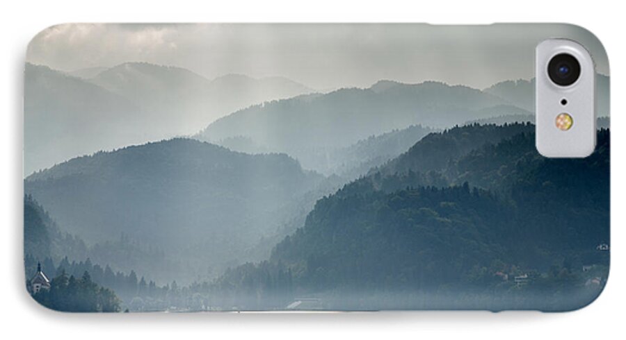 Bled iPhone 7 Case featuring the photograph Breaking through the mist by Ian Middleton