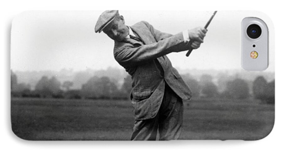 harry Vardon iPhone 7 Case featuring the photograph Harry Vardon swinging his golf club by International Images