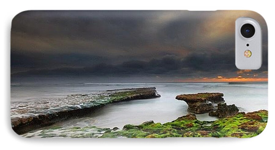  iPhone 7 Case featuring the photograph Long Exposure Of A Stormy Sunset At A by Larry Marshall