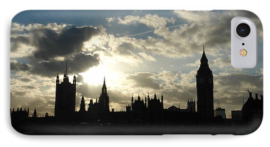 London iPhone 7 Case featuring the photograph The outline of Big Ben and Westminster and other buildings at sunset by Ashish Agarwal