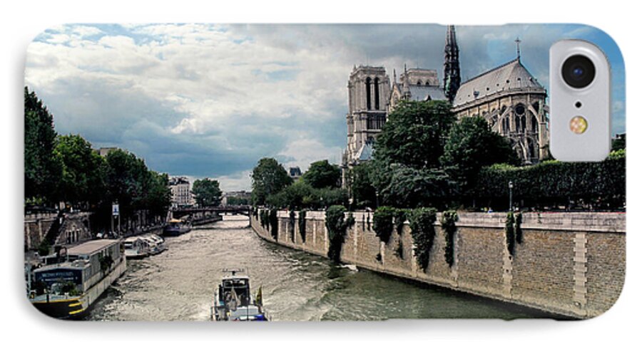 Notre Dame iPhone 7 Case featuring the photograph Tour Boat Passing Notre Dame by Dave Mills