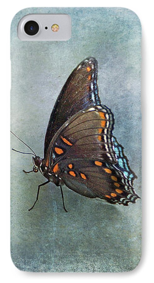 Butterfly iPhone 7 Case featuring the photograph Butterfly on Blue by Sandy Keeton