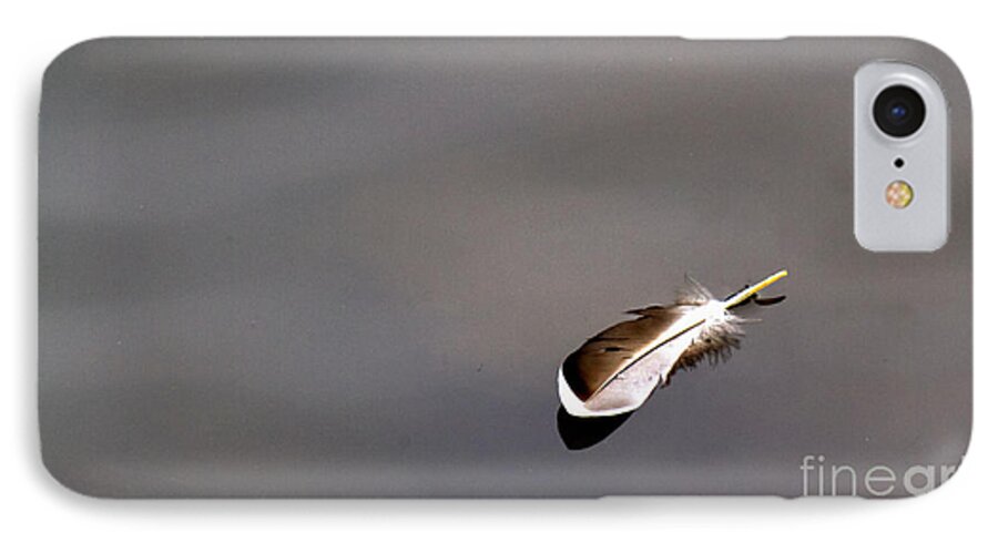 Feather iPhone 7 Case featuring the photograph Floating Feather by Jale Fancey