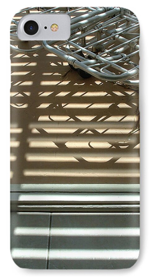 Shadows iPhone 7 Case featuring the photograph Gurneys Under a Pergola Through a Picture Window by Stan Magnan