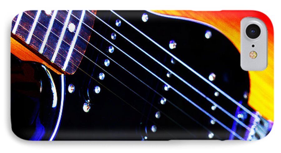 Instrument iPhone 7 Case featuring the photograph Lone Guitar by Stephen Melia