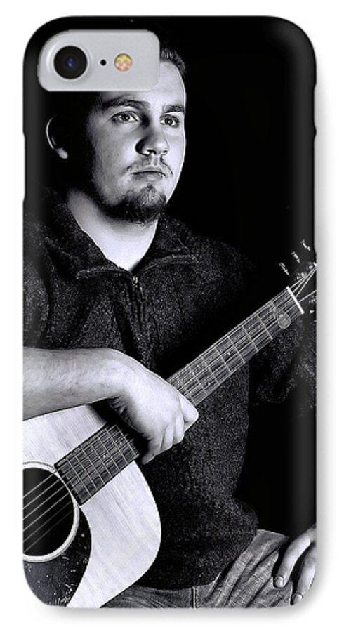 Music iPhone 7 Case featuring the photograph Musician Playing Guitar Portrait by Trudy Wilkerson