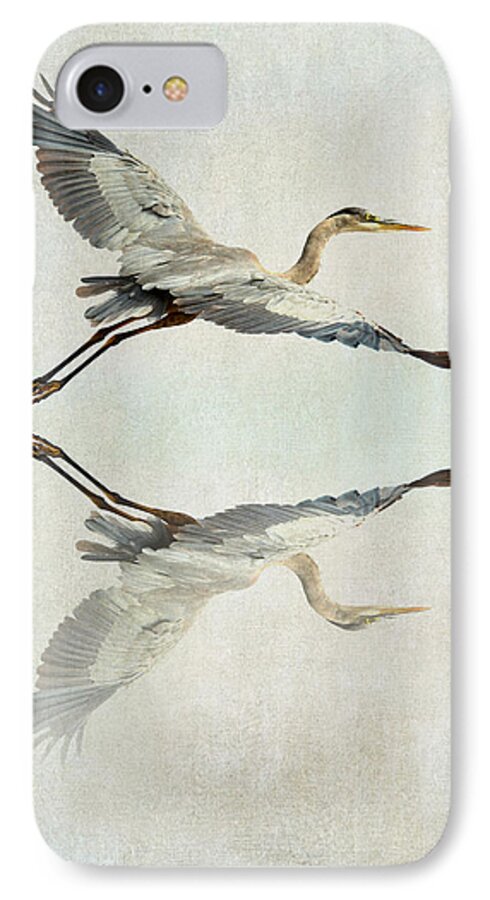 Great Blue Heron iPhone 7 Case featuring the photograph Reflective Flight by Fraida Gutovich