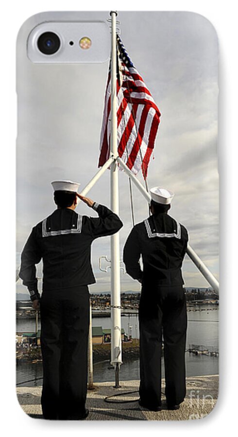 Us Navy iPhone 7 Case featuring the photograph Sailors Raise The National Ensign by Stocktrek Images