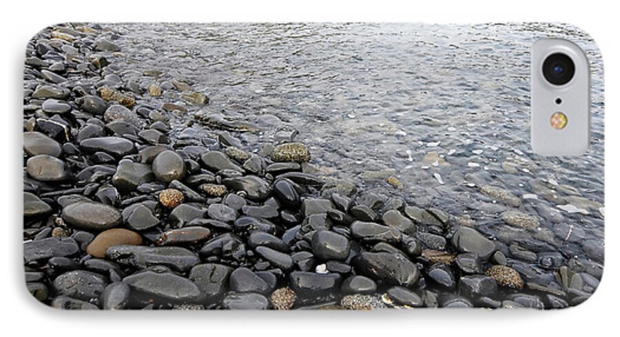 Simplicity iPhone 7 Case featuring the photograph Menorca pebble beach by Pedro Cardona Llambias