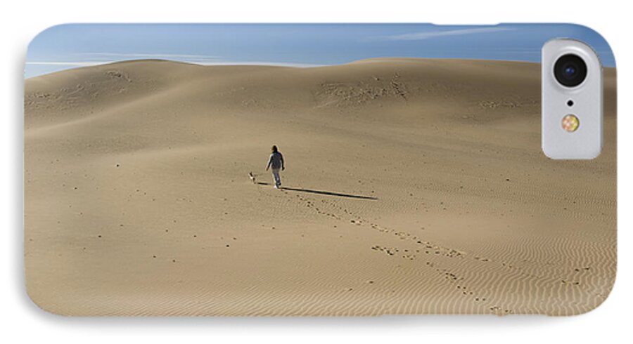 Walking iPhone 7 Case featuring the photograph Walking on the Sand by Tara Lynn