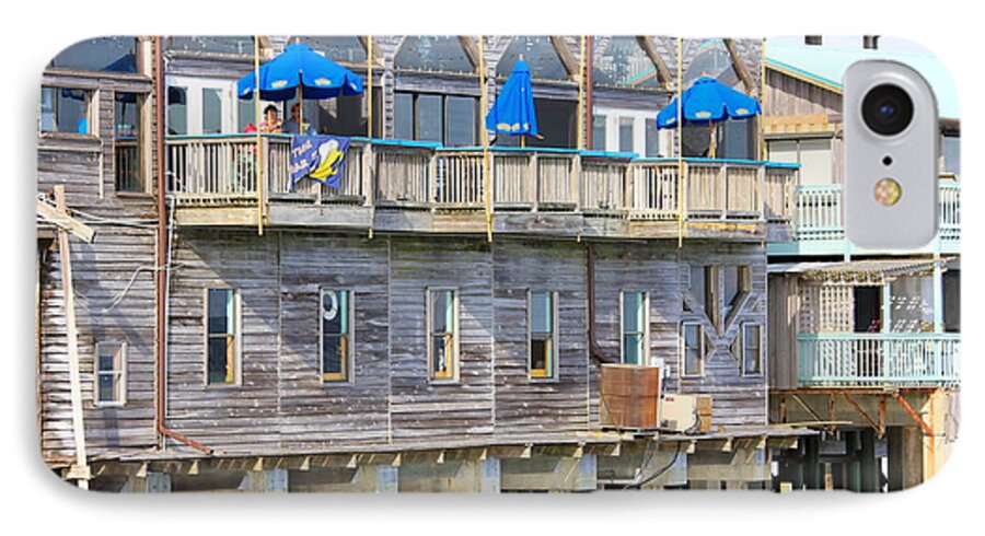Restaurant Along The Sea iPhone 8 Case featuring the photograph Building on Piles Above Water by Lorna Maza
