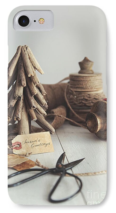 Christmas iPhone 8 Case featuring the photograph Rustic twine and ribbon for wrapping gifts by Sandra Cunningham